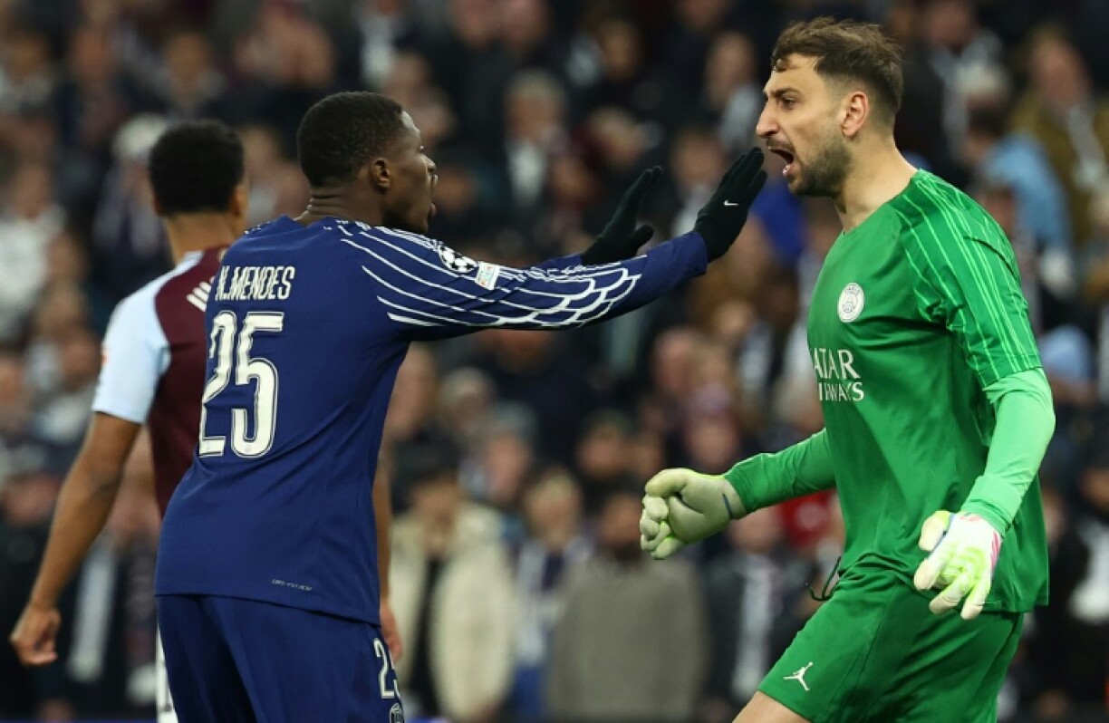 Goalkeeper Gianluigi Donnarumma (R) needed to be at his best as Paris Saint-Germain held on against Aston Villa on Tuesday to reach the Champions League semi-finals