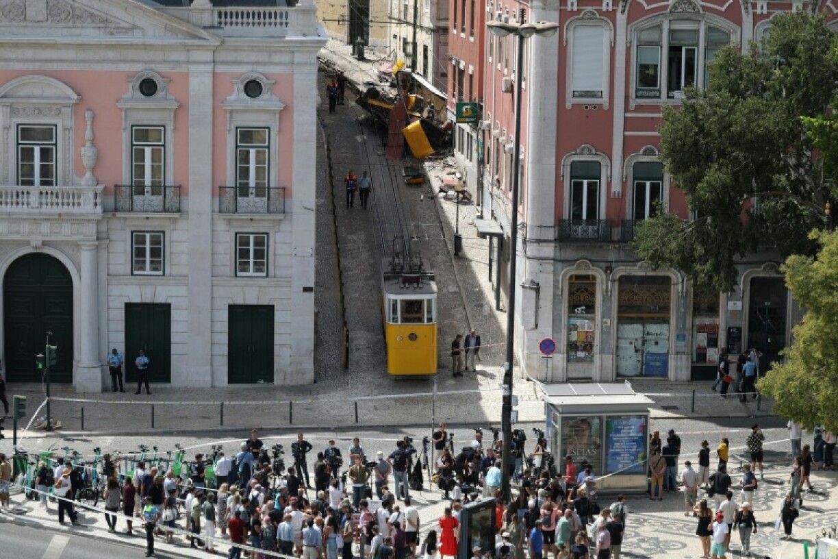 The ruined hulk of the crashed yellow carriage is still splayed out at the site of the accident