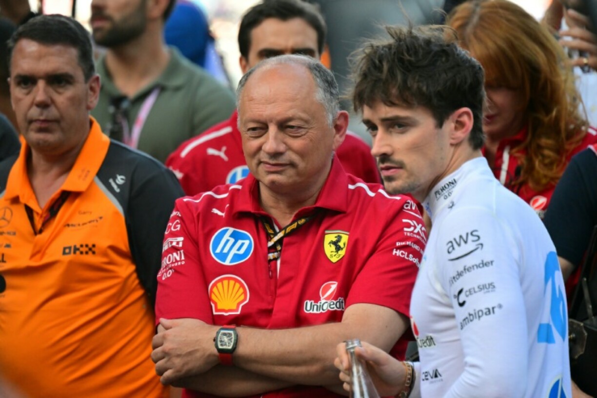 Ferrari's team principal Fred Vasseur (left) signs new deal to the relief of Charles Leclerc (right)