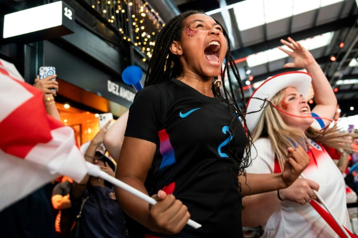 England fans roar on their team in the tense penalty shoot-out