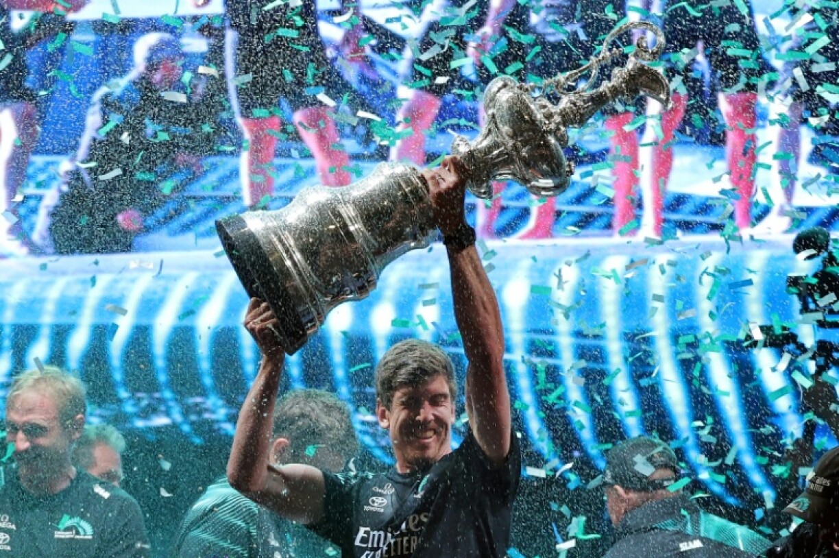 Team New Zealand's co-skipper and helmsman Peter Burling raises the America's Cup in Barcelona last year