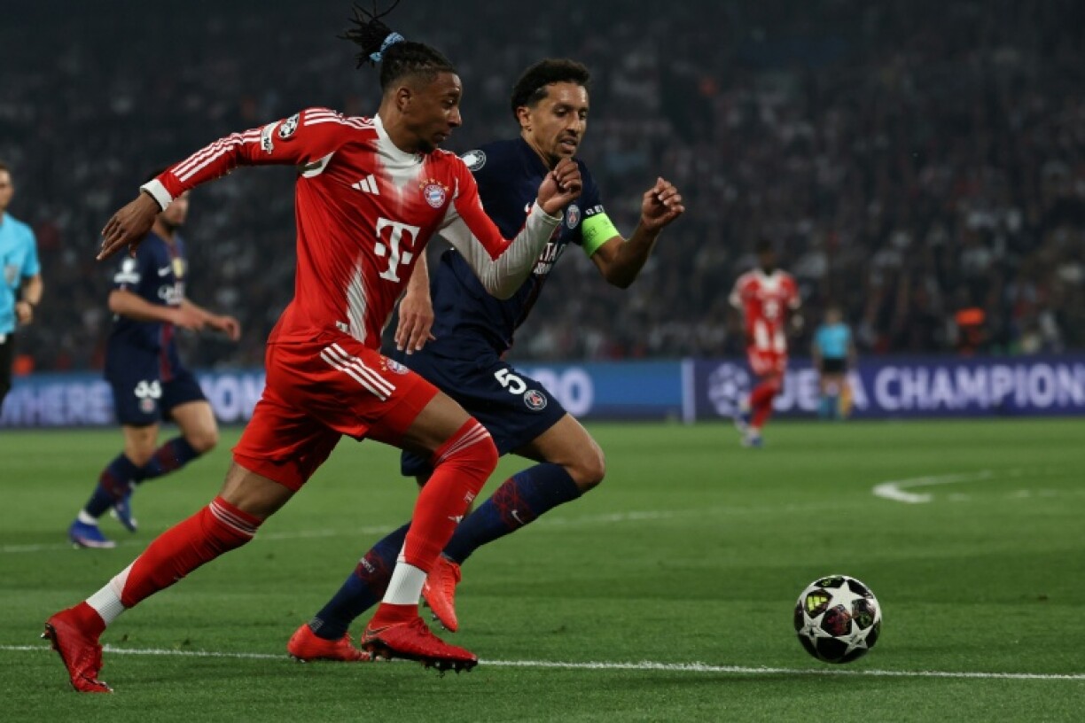 Michael Olise, attaquant français du Bayern Munich, à la lutte avec le défenseur et capitaine du PSG Marquinhos lors de la demi-finale aller de la Ligue des champions le 28 avril 2026 au Parc des Princes