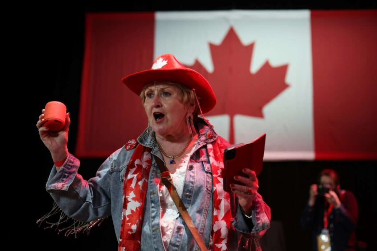 Liberal Supporter Dorothy Goubault celebrates the Canada election result