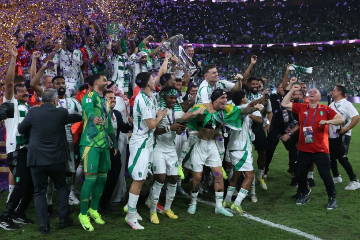 Al Ahli's players celebrate wining the AFC Champions League