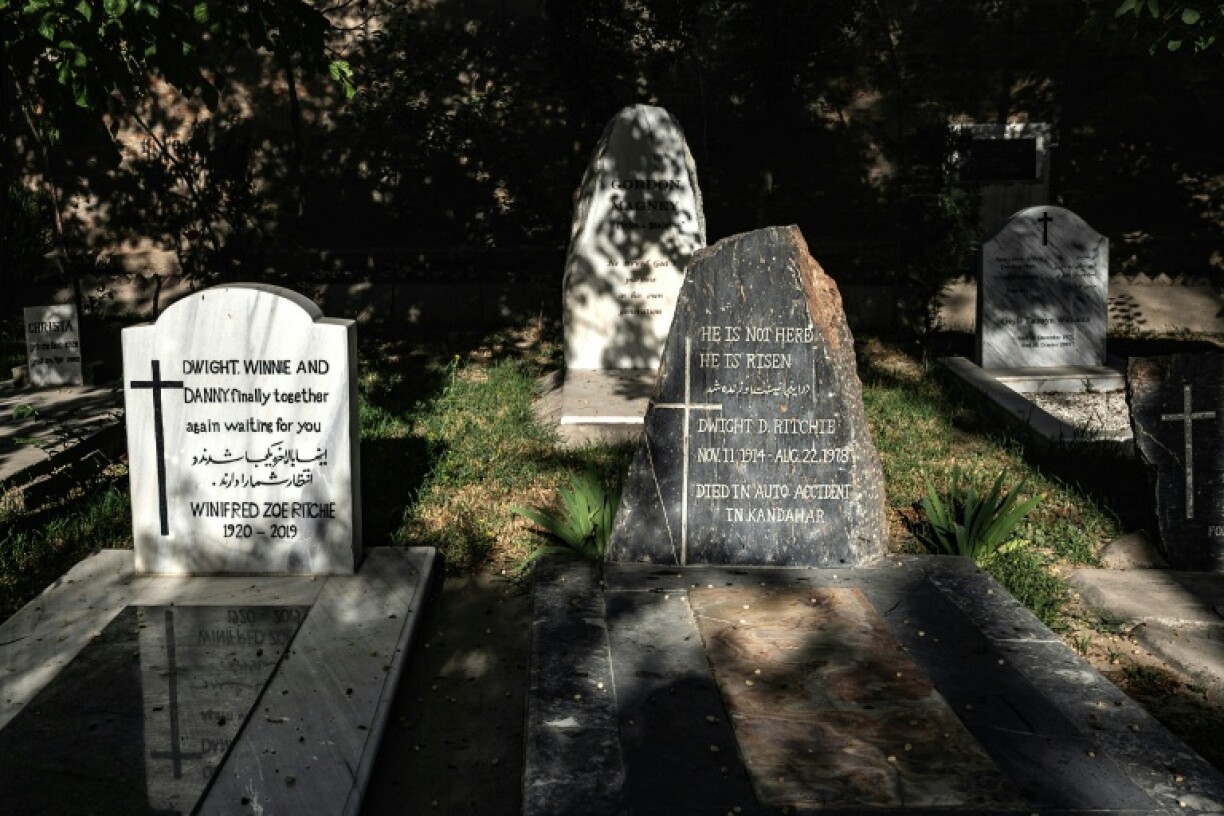The grave of Winifred Zoe Ritchie (L) lies next to that of her husband Dwight, who died in a car crash in Afghanistan some 40 years earlier