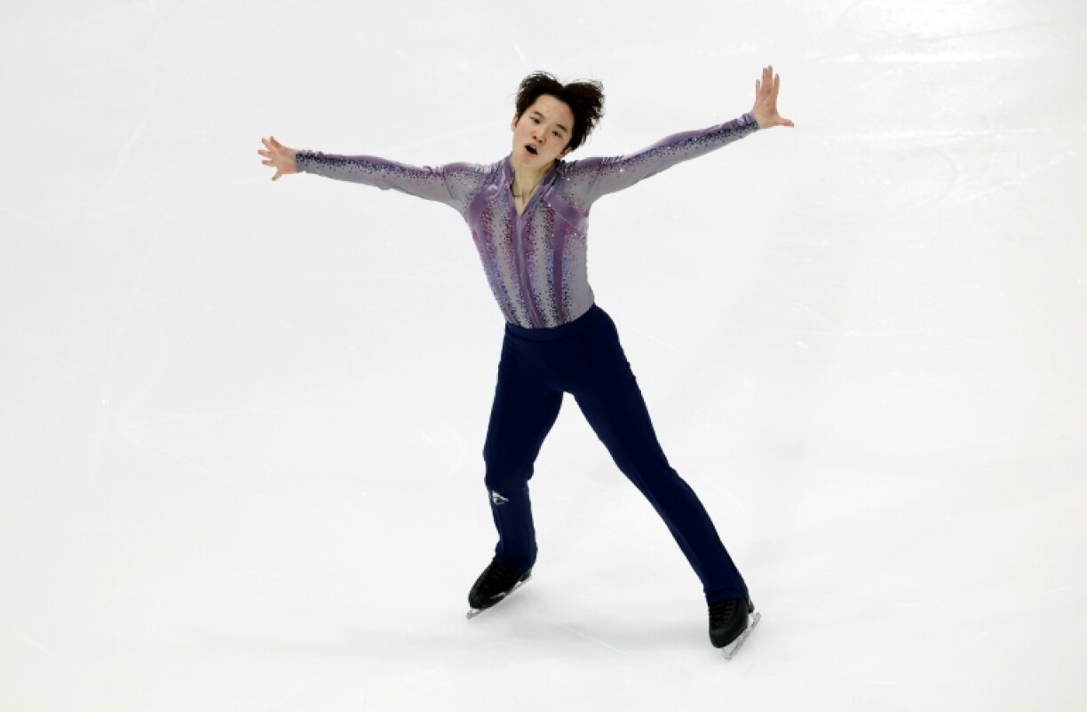 Japan's Kazuki Tomono leads after the men's short program at the Skate America figure skating grand prix in Lake Placid, New York