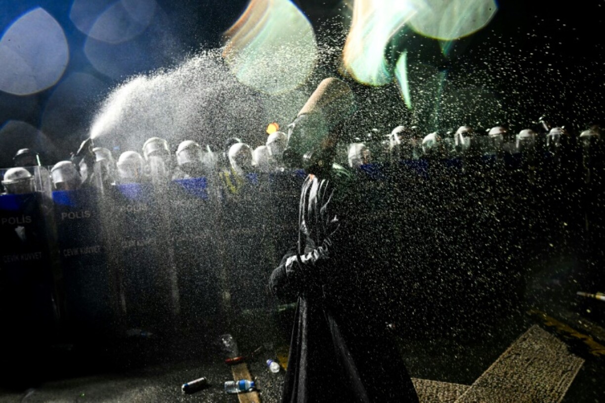 Riot police cracked down on protesters outside Istanbul City Hall and roughly dispersed a student sit-in on Galata Bridge