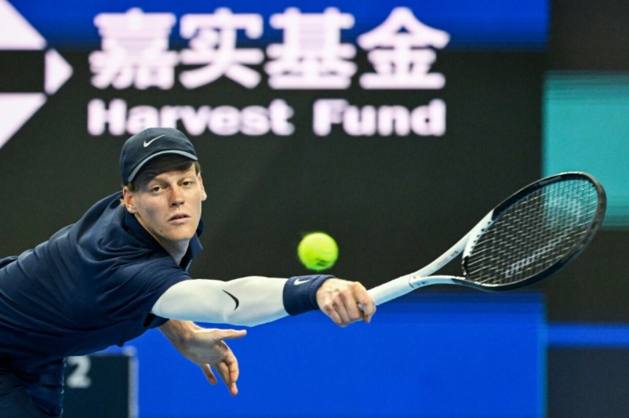 Italy’s Jannik Sinner hits a return to Croatia’s Marin Cilic