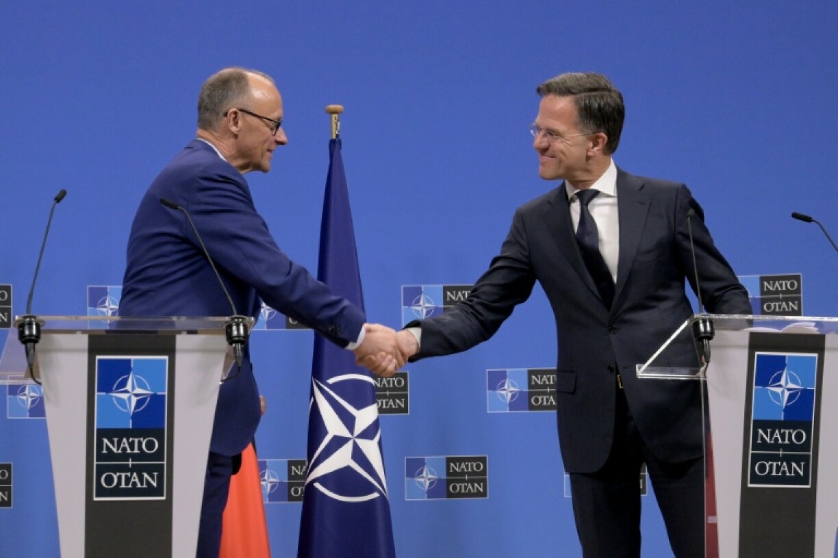 German Chancellor Friedrich Merz (L) met NATO head Mark Rutte to talk security and defence on his first week in office