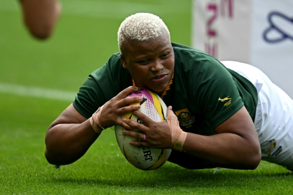 South Africa No 8 Aseza Hele scores a try during a 66-6 Women's Rugby World Cup Pool D win over Brazil in Northampton