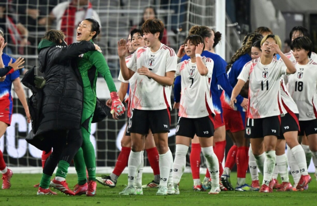 Japan's players celebrate winning the SheBelieves Cup after defeating the USA 2-1 in the deciding match