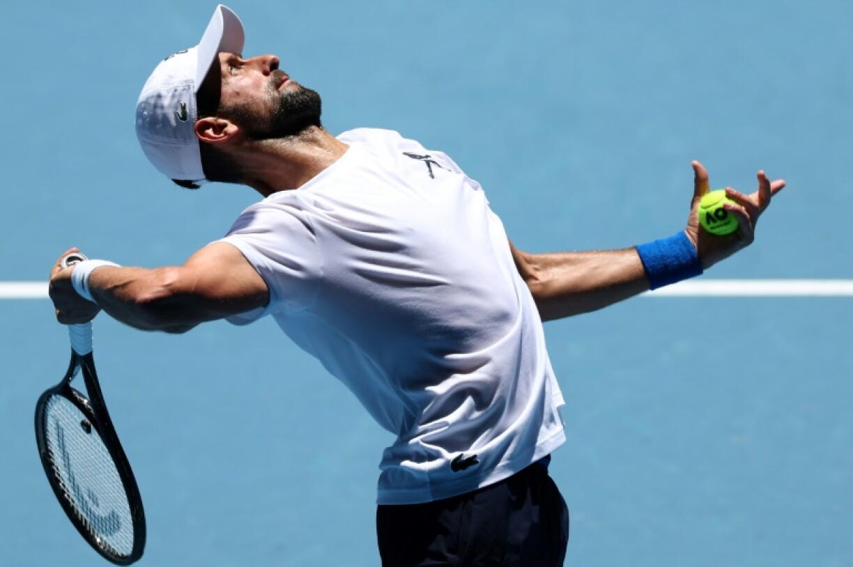 Serbia's Novak Djokovic serves during a practice session ahead of the Australian Open