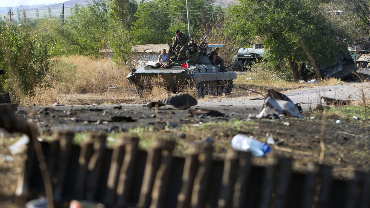 Pro-Russian separatists on a tank after the battle of Ilowjask, 4 September, 2014