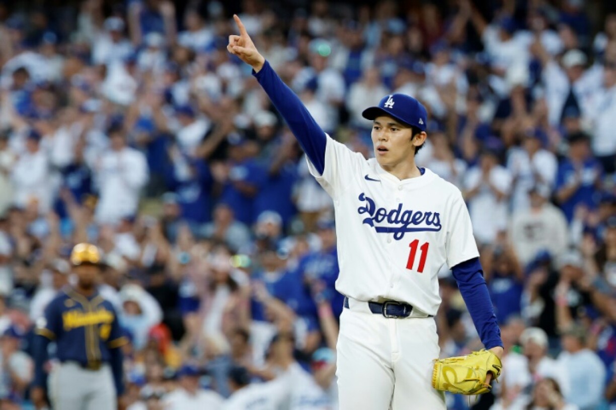 Los Angeles Dodgers reliever Roki Sasaki reacts as his team take a 3-0 playoff series lead over the Milwaukee Brewers