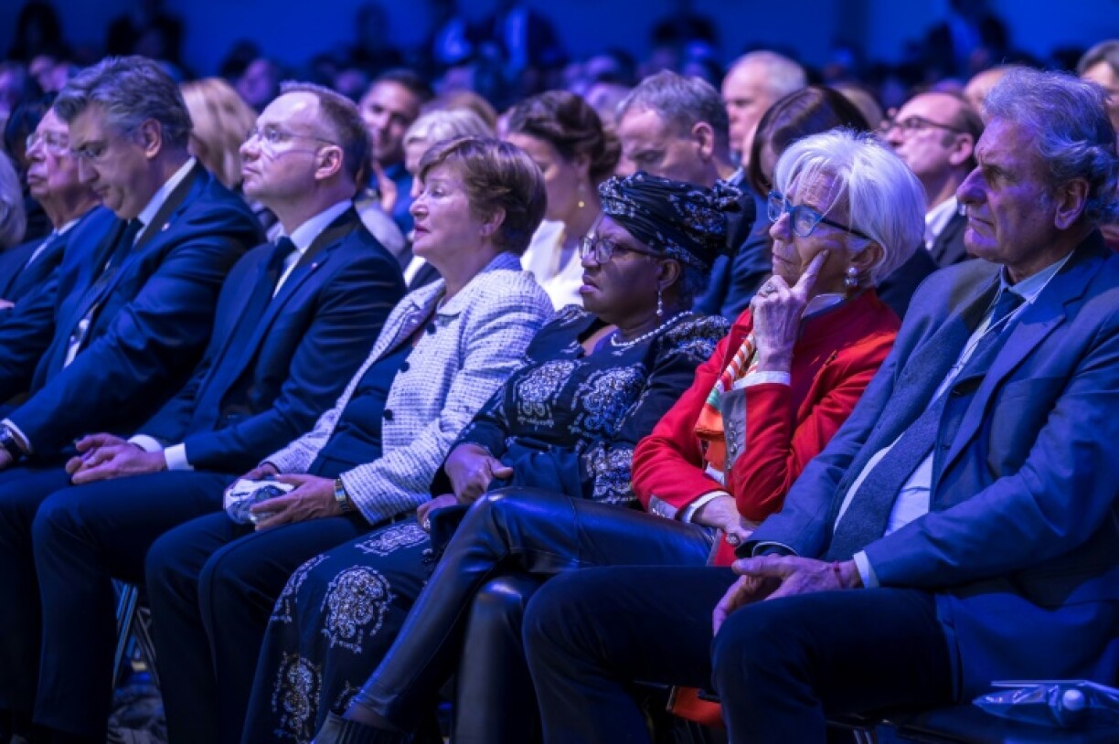 Those in the packed hall included World Trade Organization chief Ngozi Okonjo-Iweala, as well as European Central Bank President Christine Lagarde and International Monetary Fund managing director Kristalina Georgieva