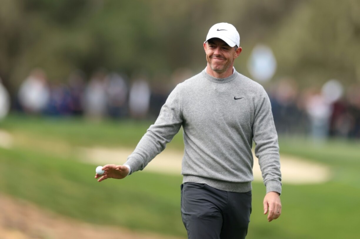Rory McIlroy acknowledges the crowd after his opening round hole-in-one at the PGA Tour's Pebble Beach Pro-Am tournament in California on Thursday
