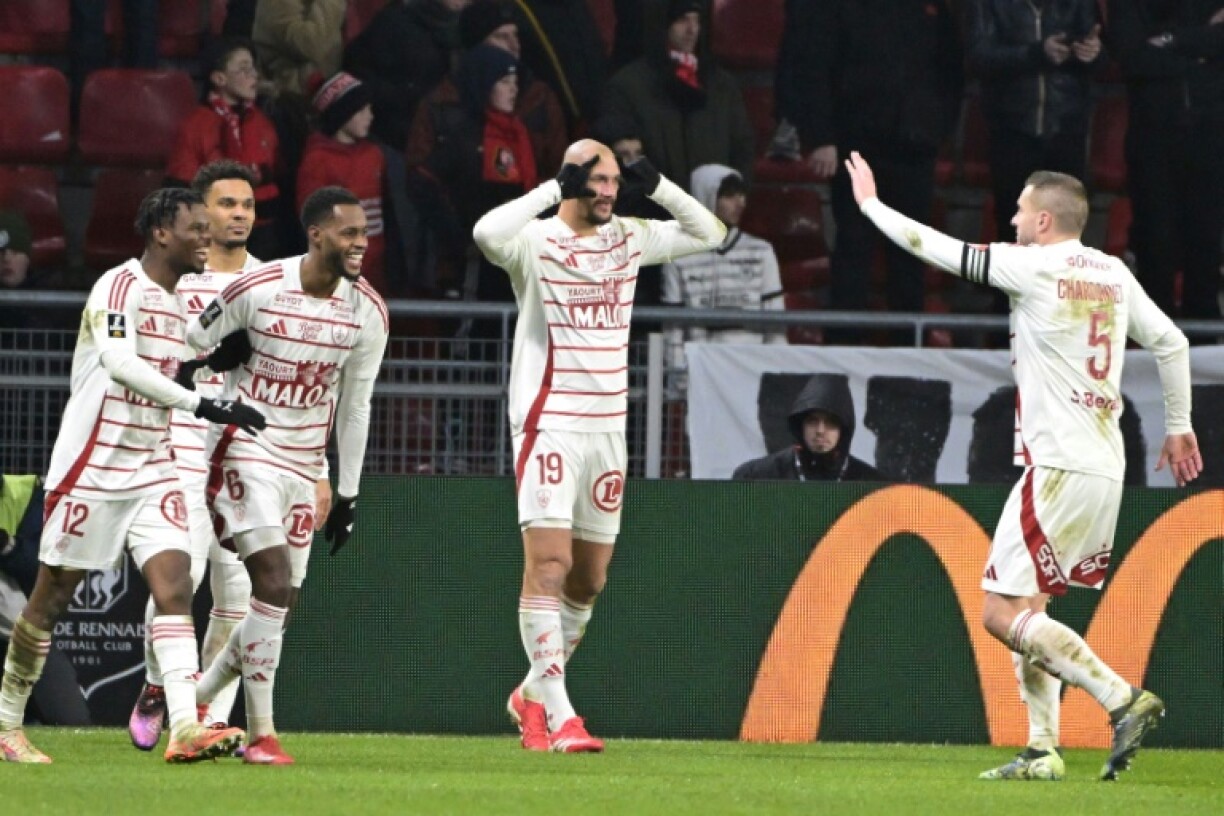 Ludovic Ajorque (2nd-R) got the winner for Brest at Rennes