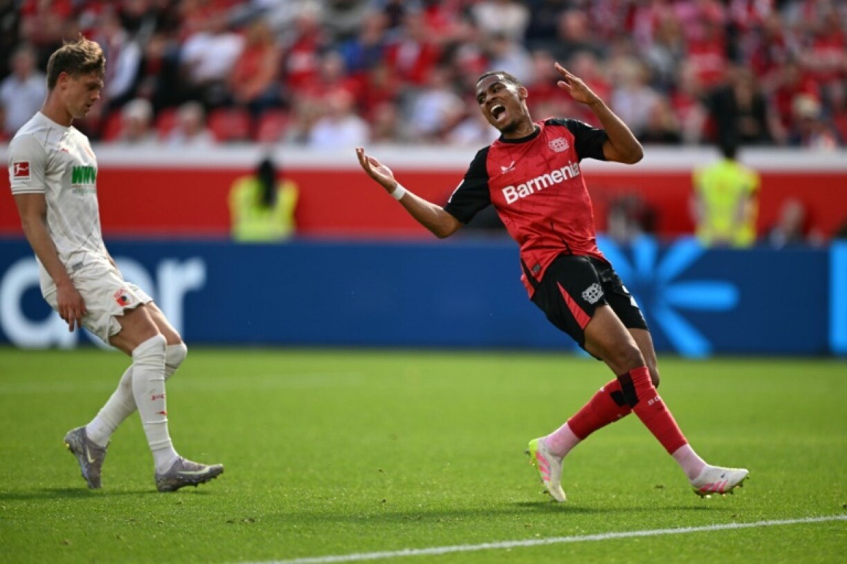 Moroccan international wing Amine Adli (R) signed for Bournemouth from Bayer Leverkusen saying the people at the English club are full of love