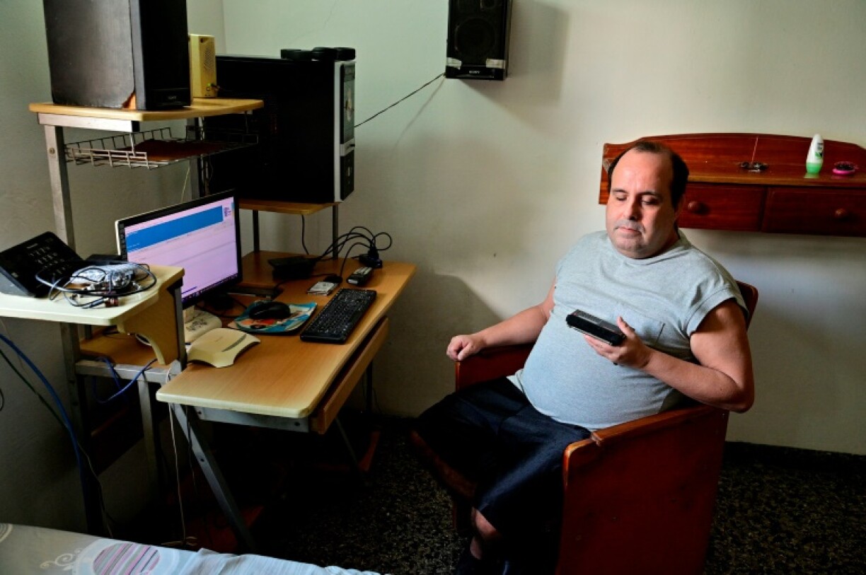 Alexis Castillo, who at 54 is congenitally blind, likes to listen to all Cuban radio soap operas, record them, and share them on social networking groups