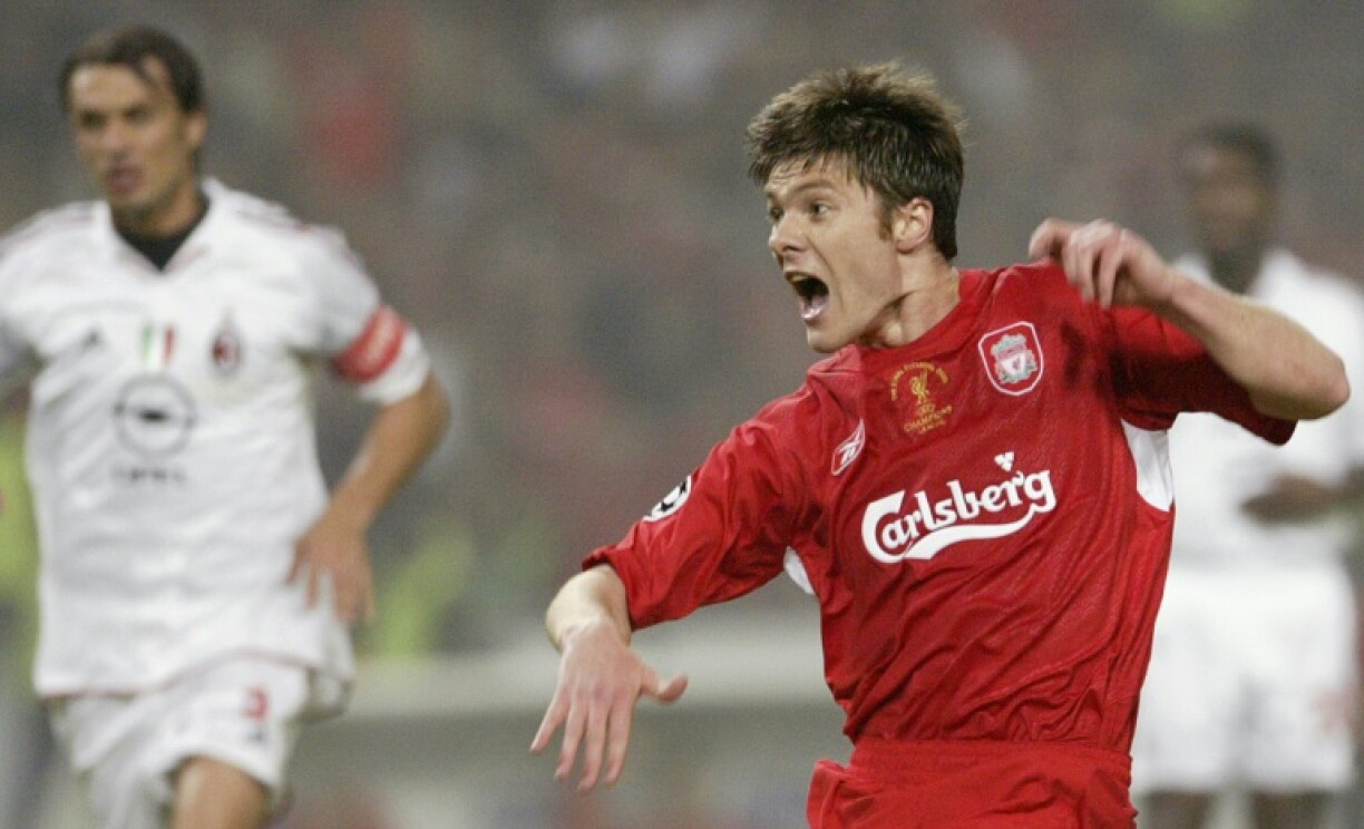 Xabi Alonso (R) during his time with Liverpool, where he won the Champions League