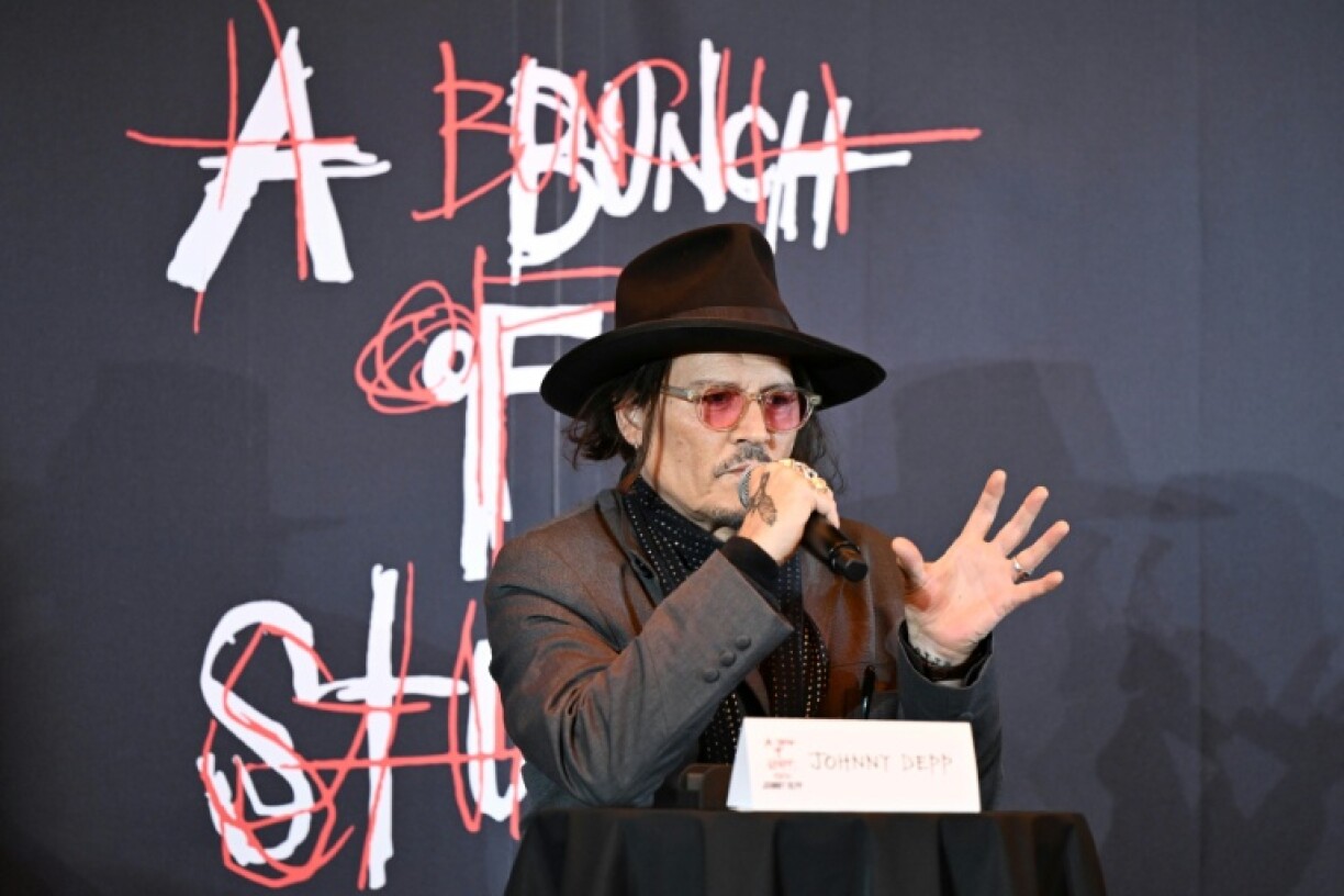 US actor Johnny Depp opened an exhibition of dozens of his artworks in Tokyo