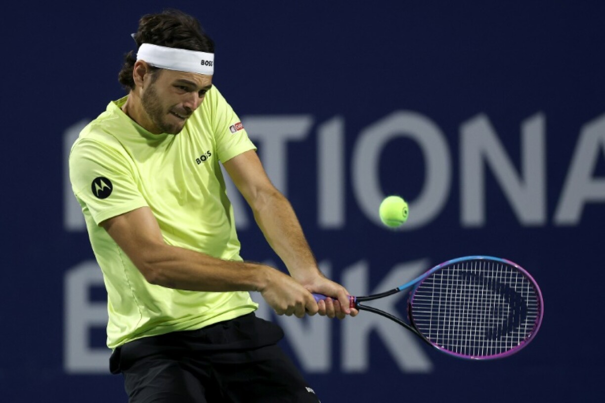 American Taylor Fritz hits a backhand n the way t a victory over Spain's Roberto Carballes Baena at the ATP Toronto Masters