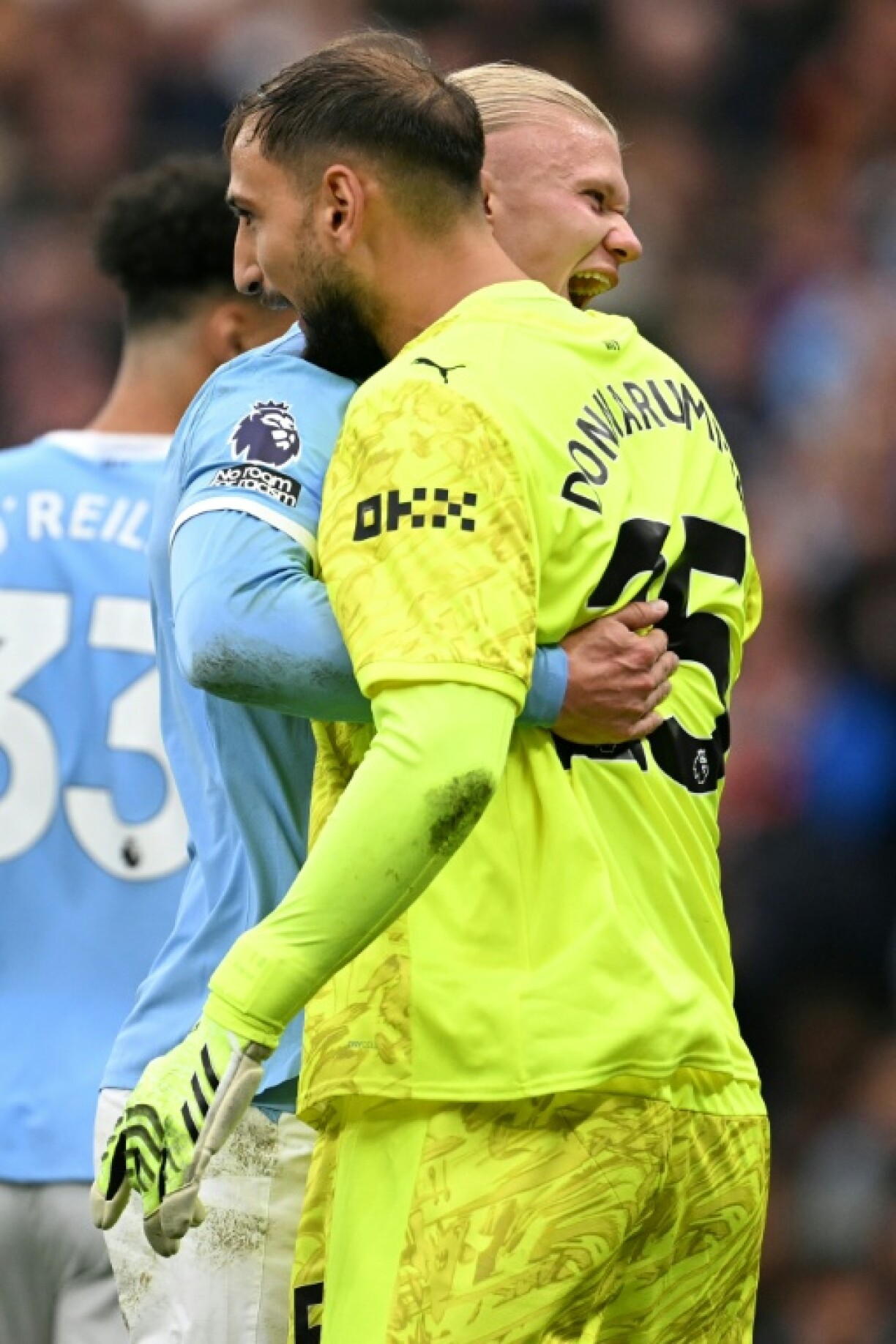 Gianluigi Donnarumma marked his debut with a stunning save from Bryan Mbeumo to deny United a foothold in the game at 2-0