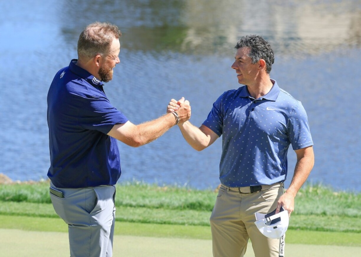 Shane Lowry (left) says playing alongside close friend Rory McIlroy has helped his strong start to the Arnold Palmer Invitational