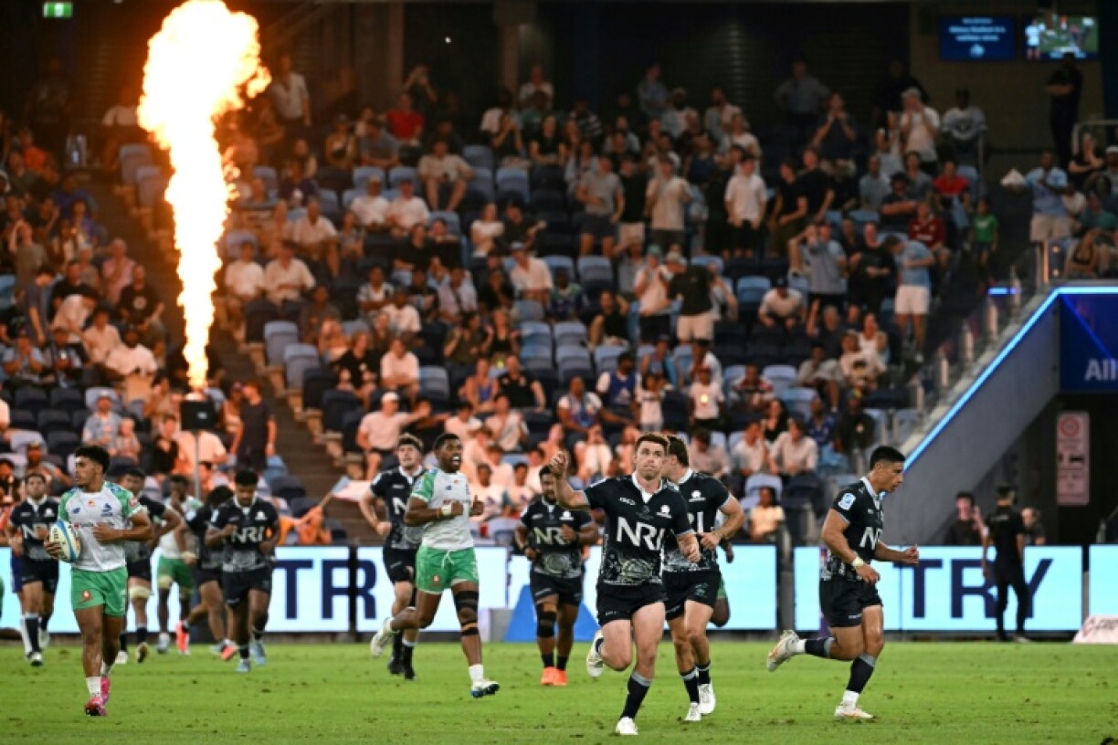 The NSW Waratahs celebrate a try against Fijian Drua in Sydney