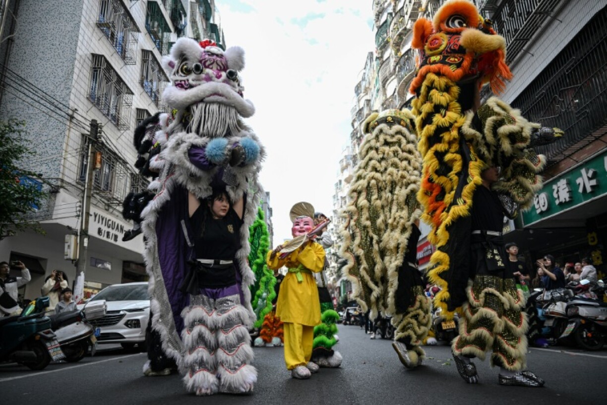 The lion dance can be tough on performers' bodies, with one often required to lift another by the waist
