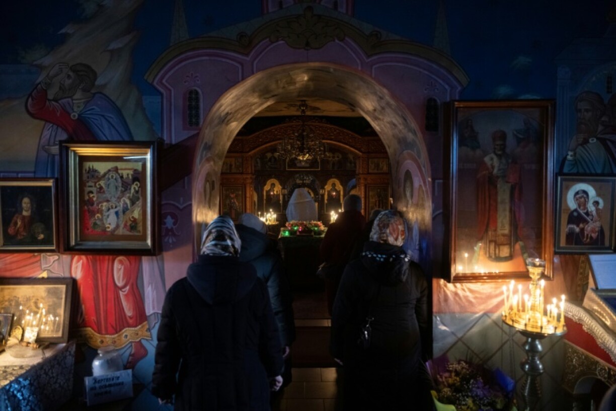 The crowd gathered in an underground part of the church