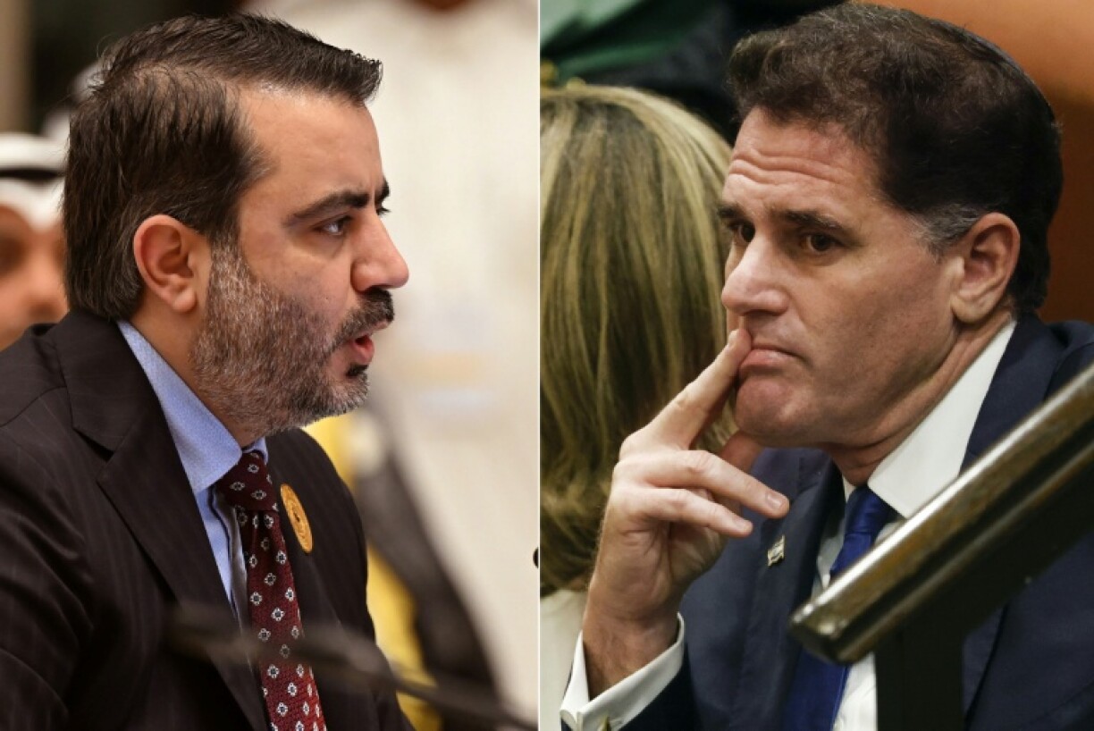 Syrian Foreign Minister Asaad al-Shibani (L) attended a diplomatic meeting in Paris with Israel's Strategic Affairs Minister Ron Dermer to discuss de-escalation of violence in Syria