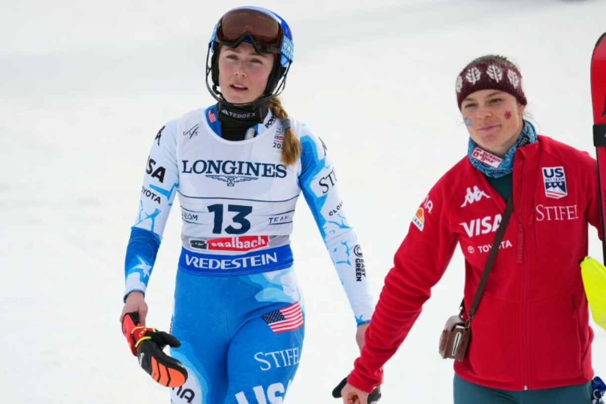 US' Mikaela Shiffrin (L) and teammate Breezy Johnson combined to win world championships team gold