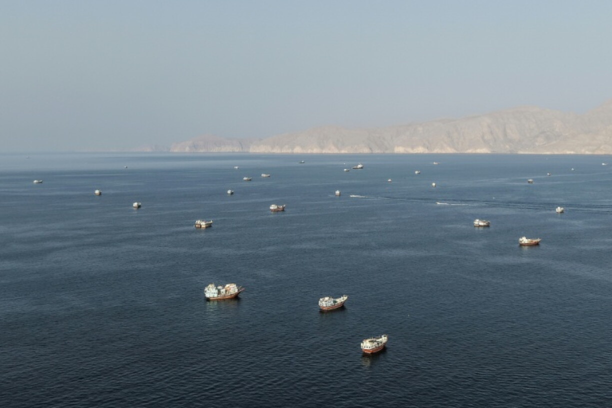 Ships anchored off the coast of Musandam governorate in Oman near the Strait of Hormuz on Friday