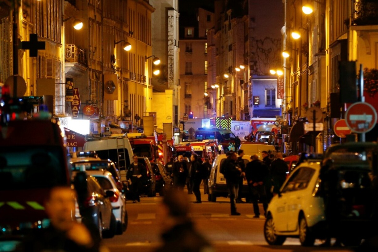 Police, firefighters and medical teams filled the streets outside the Bataclan venue in central Paris after the deadly attacks