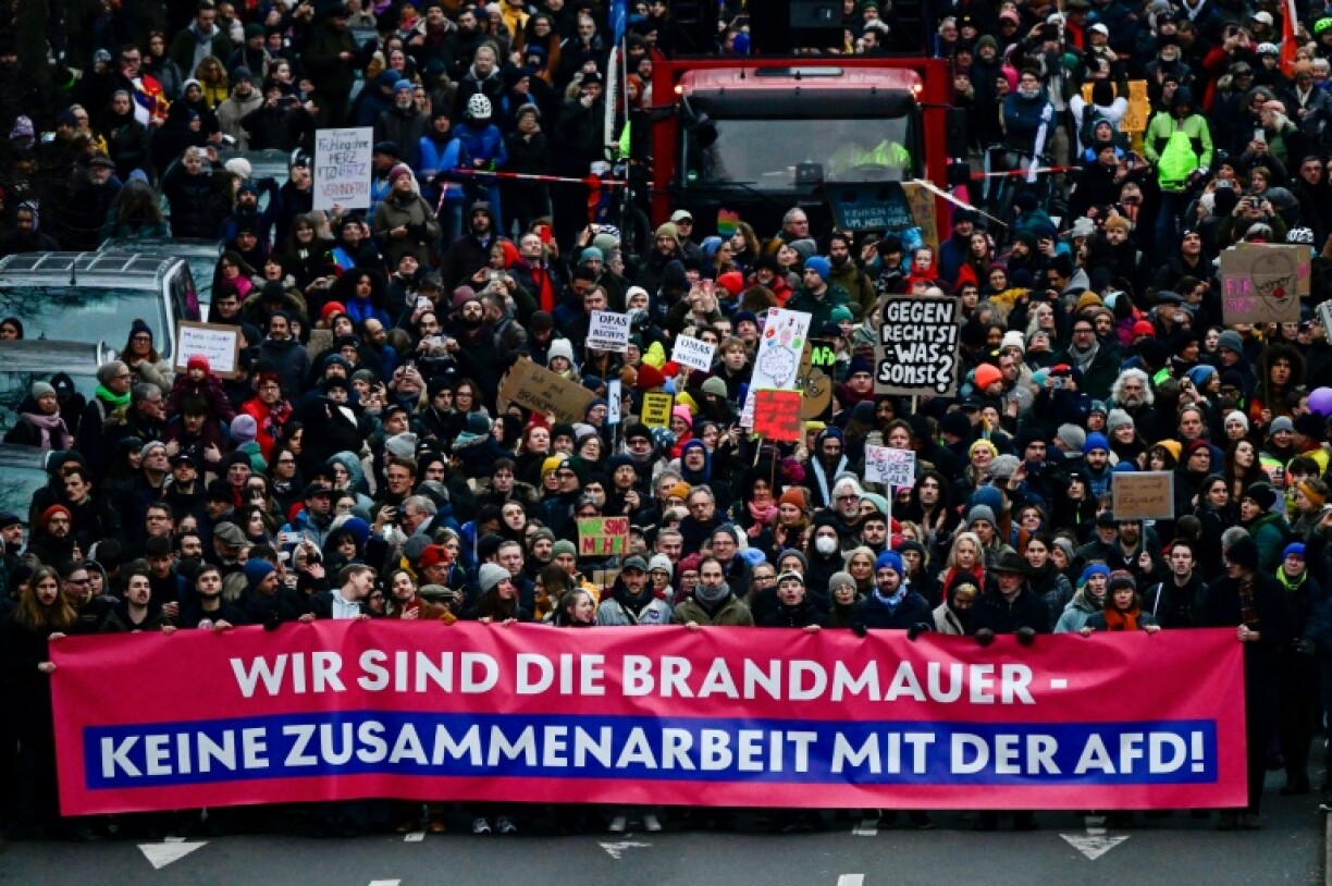 Tens of thousands protested the CDU's shattering of the 'firewall' against cooperating with the far right