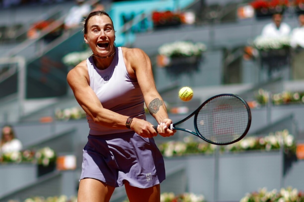 Belarus' Aryna Sabalenka returns a ball to Russia's Anna Blinkova