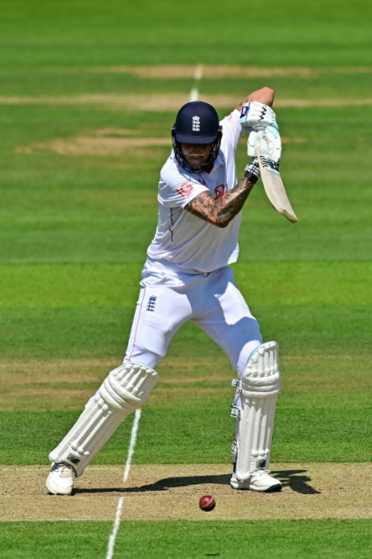 England's Brydon Carse drives during his 56 against India in the third Test at Lord's
