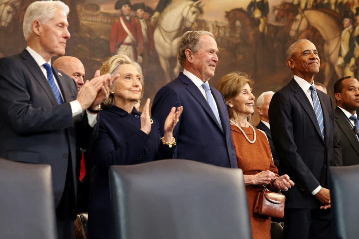 (L-R) Former U.S. President Bill Clinton, former U.S. Secretary of State Hillary Clinton, former U.S. President George W. Bush, former first lady Laura Bush and former U.S. President Barack Obama arrive to the inauguration of U.S. President-elect Donald Trump in the Rotunda of the U.S. Capitol on January 20, 2025 in Washington, DC. Donald Trump takes office for his second term as the 47th president of the United States.