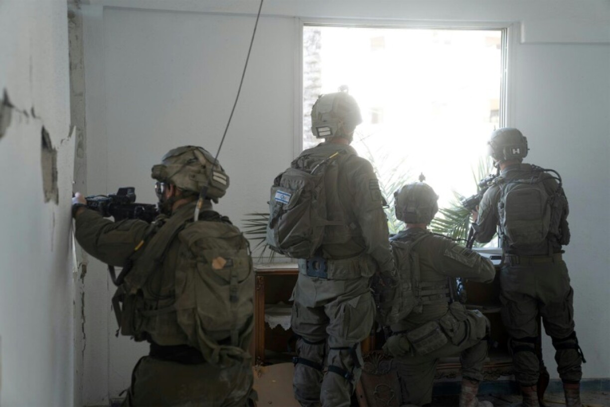 Une photo fournie par l'armée israélienne le 18 juin 2024 montre des soldats israéliens opérant dans la bande de Gaza