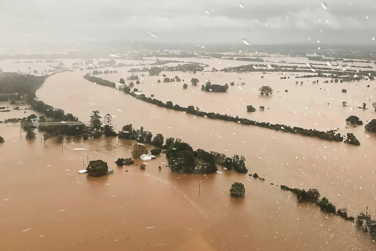 One man was found dead in a flooded home in eastern Australia