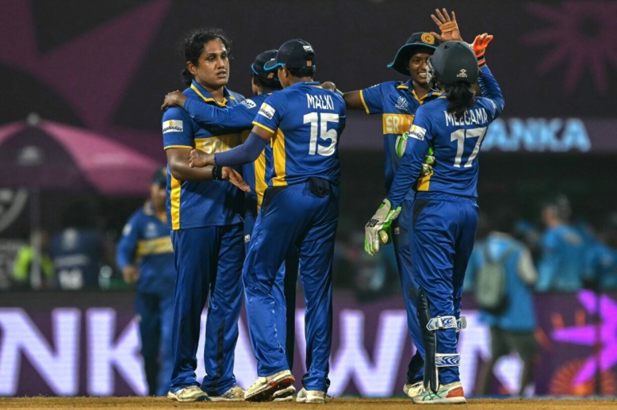 Chamari Athapaththu (L) took three wickets in the final over to grab Sri Lanka a remarkable win