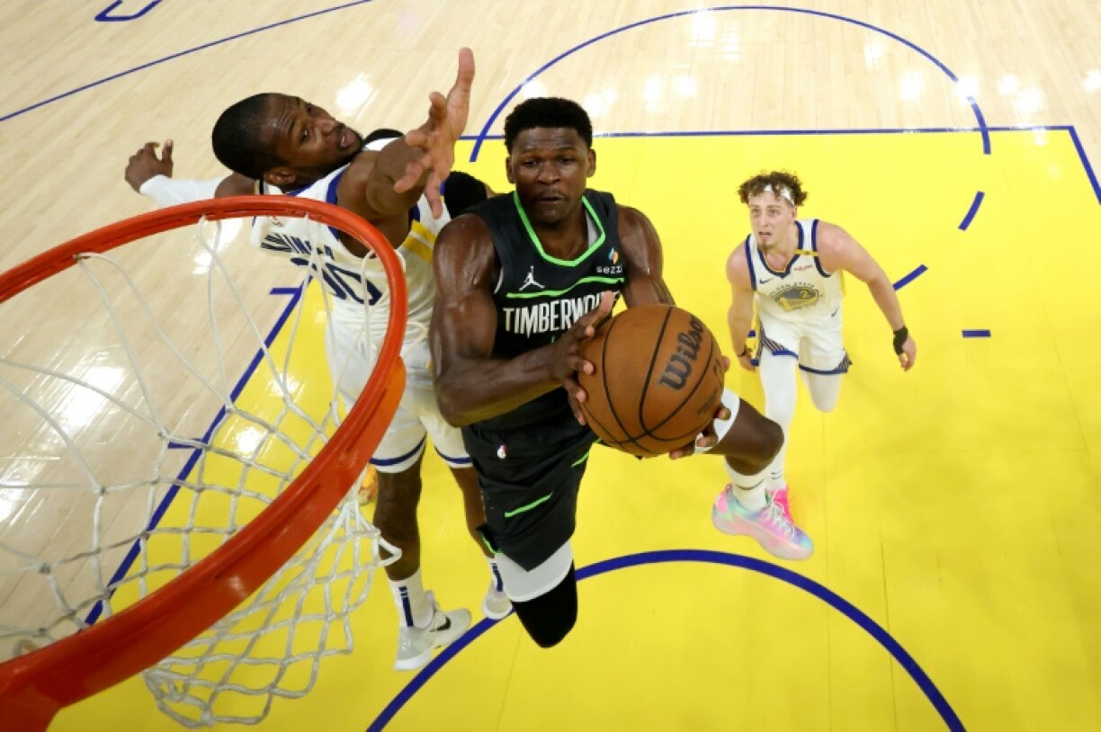 Minnesota's Anthony Edwards drives to the basket on his way to leading the Timberwolves to an NBA playoff victory at Golden State