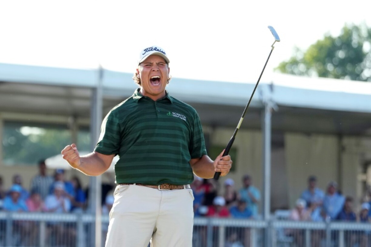 Aldrich Potgieter of South Africa celebrates winning the Rocket Classic for his first PGA Tour title