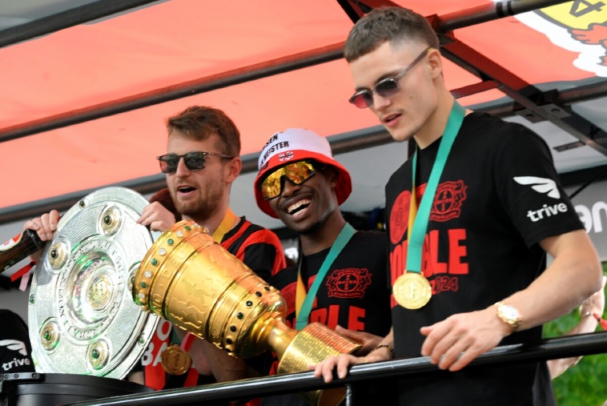 Florian Wirtz (right) inspired Leverkusen to a German league and cup double in 2023/24