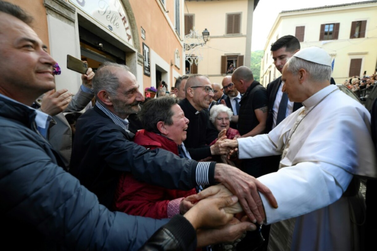 Pope Leo greeted some of the faithful during a 'private visit' to an Augustinian shrine just outside Rome