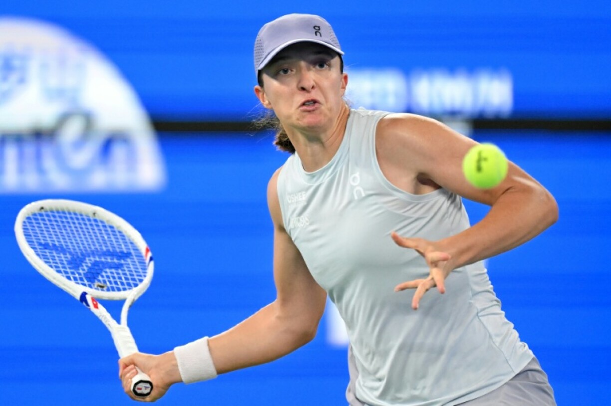 Poland's Iga Swiatek eased past the Czech Republic's Marie Bouzkova during the Wuhan Open tennis tournament