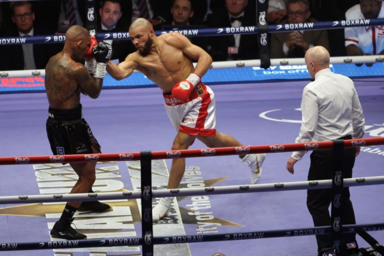 Britain's Chris Eubank (right) in action against Conor Benn at Tottenham Hotspur Stadium