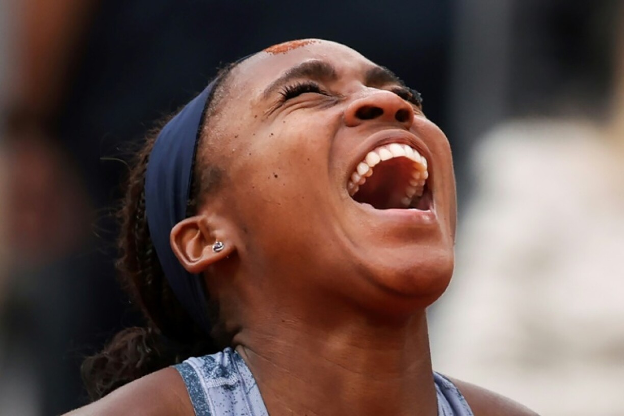 Coco Gauff celebrates winning the French Open