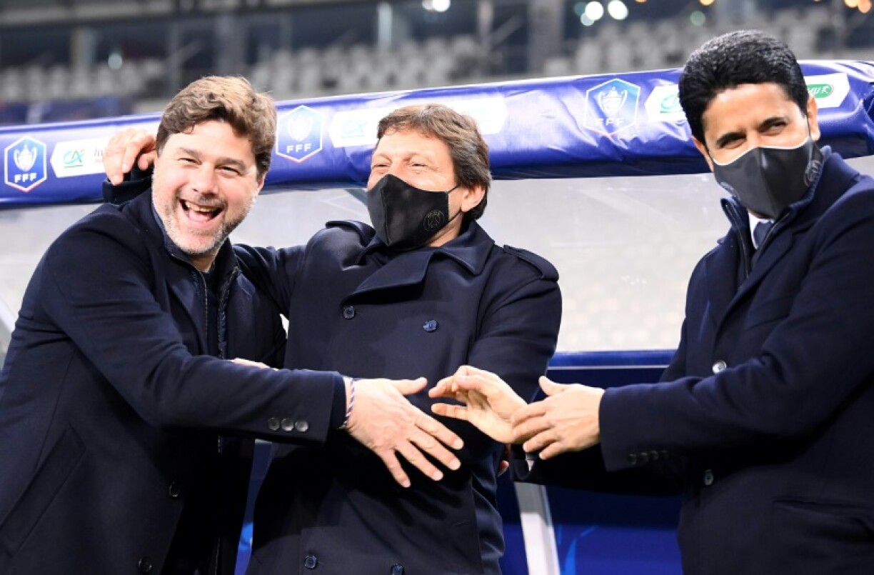 L'entraineur du Paris SG, Mauricio Pochettino (G), le directeur sportif du club Leonardo (C) et son président Nasser Al-Khelaïfi après la victoire du Paris SG en finale de Coupe de France face à Monaco, le 19 mai 2021